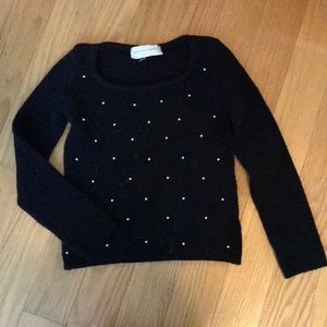 Black sweater with pearls